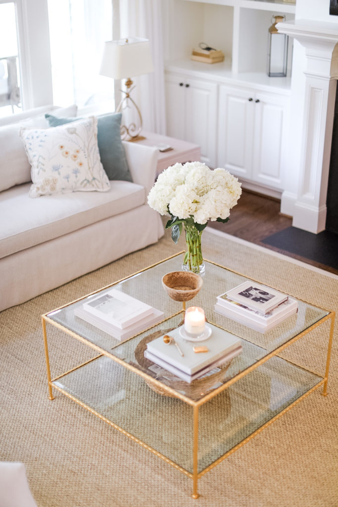 How To Decorate A Coffee Table 7 Tips, Round Glass Coffee Table Decorating Ideas