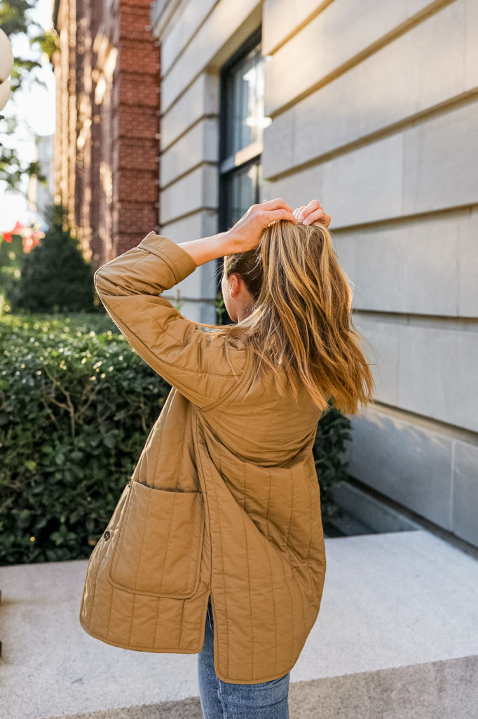 woman wearing Everlane quilted lightweight fall jacket