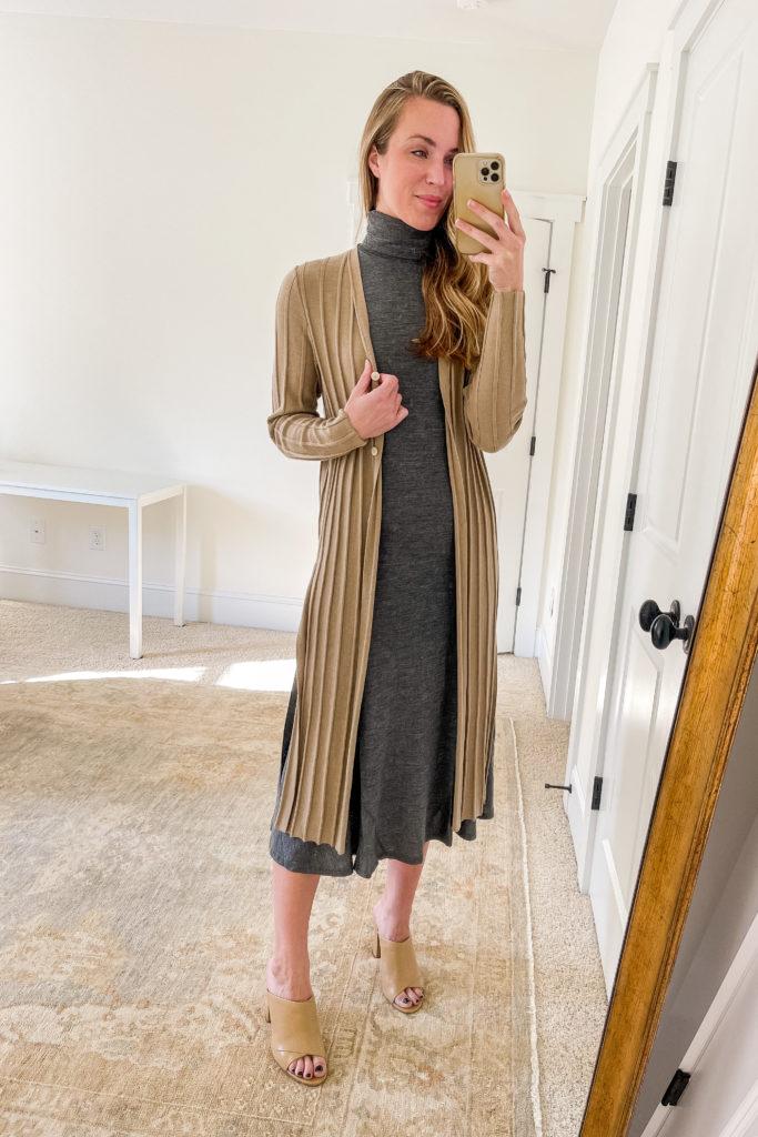 Natalie Yerger wearing long cardigan outfit with dress theory cardigan gray turtleneck dress vince heeledn mules