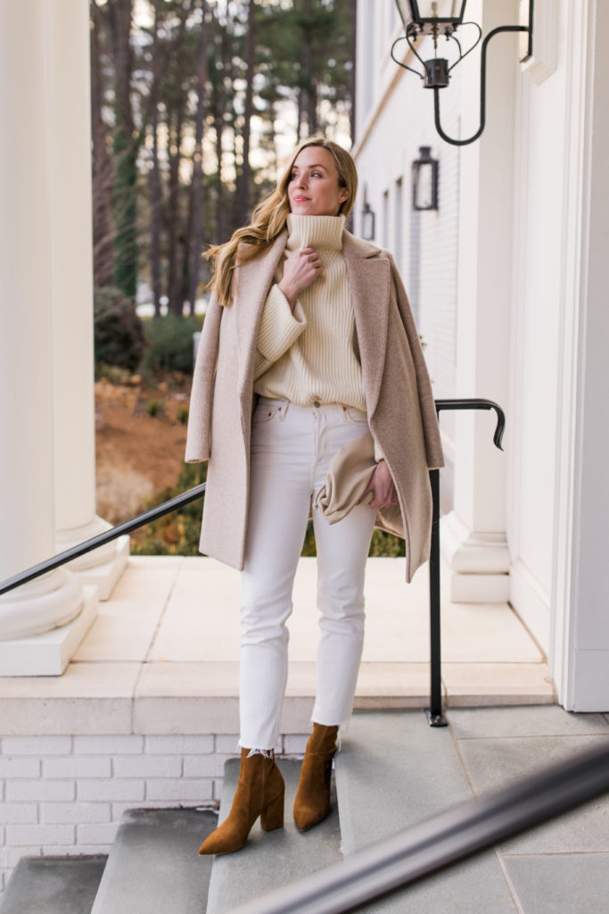 white jeans winter outfit with camel coat and Loeffler Randall Isla boots