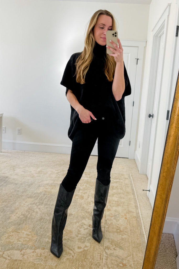 how to wear black jeans with a black sweater and knee high boots outfit