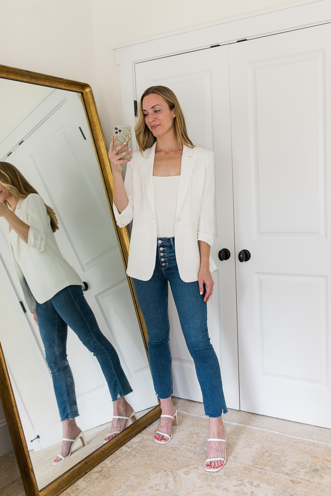 white blazer outfit with blue jeans and white top