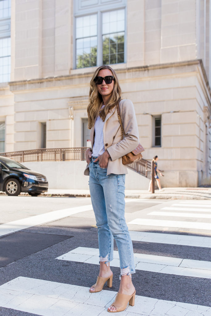 beige blazer with white t-shirt and light wash jeans