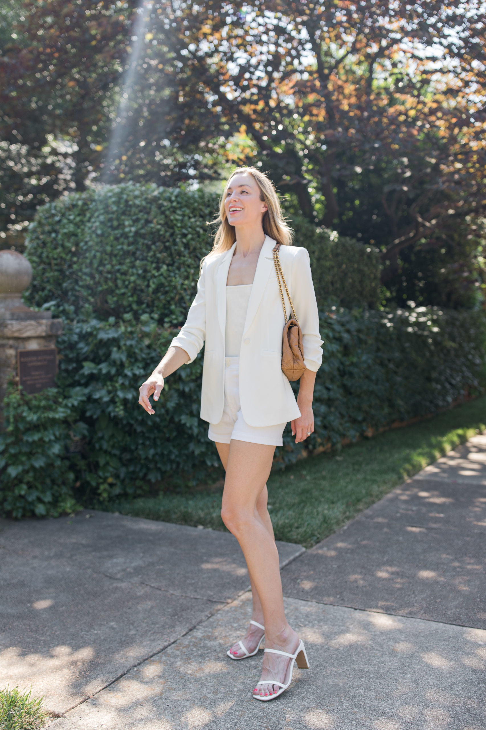 all white summer outfit with blazer and shorts