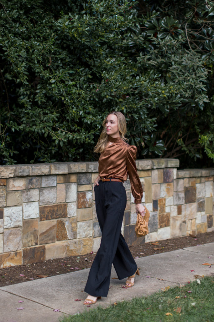 fall event outfit idea with black trousers and a silk blouse